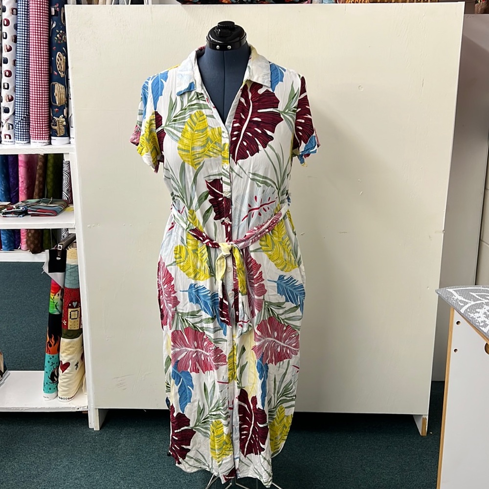 Summer dress, very light weight w/ pockets. Slits on both sides. A large large